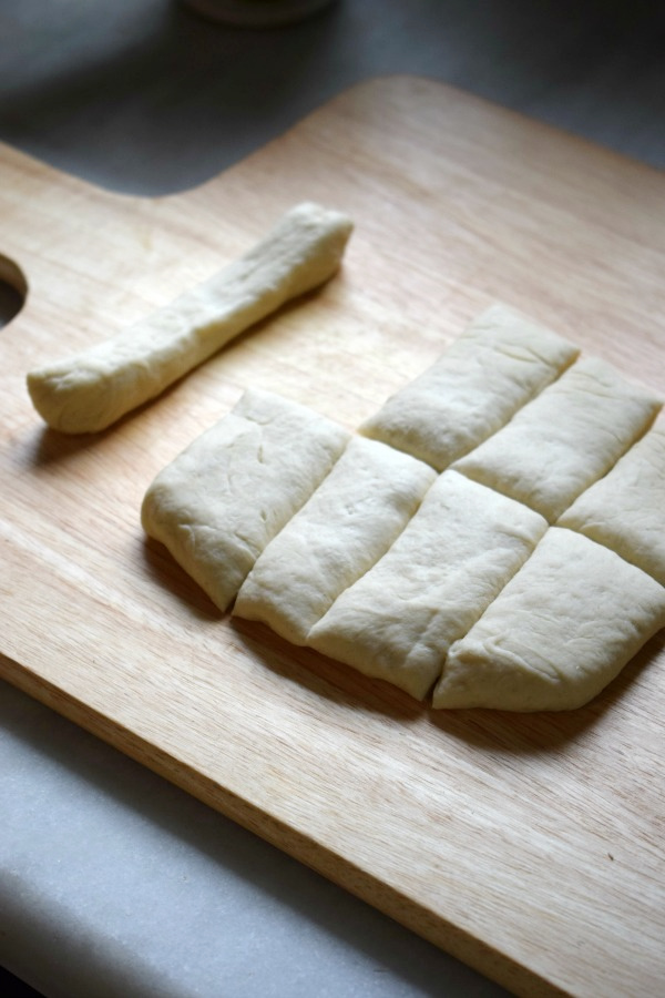 Making garlic knots.