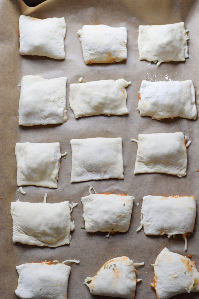 Pizza pockets ready to bake.