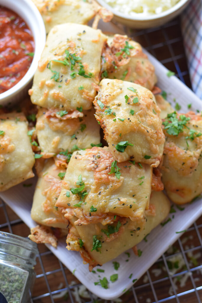 Pizza bites on a plate.