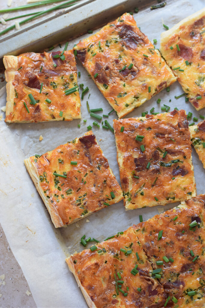 Close up of breakfast sheet pan quiche.