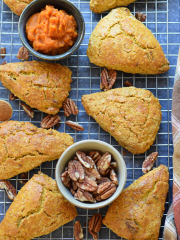 Pecan pumpkin scones on a baking tray.
