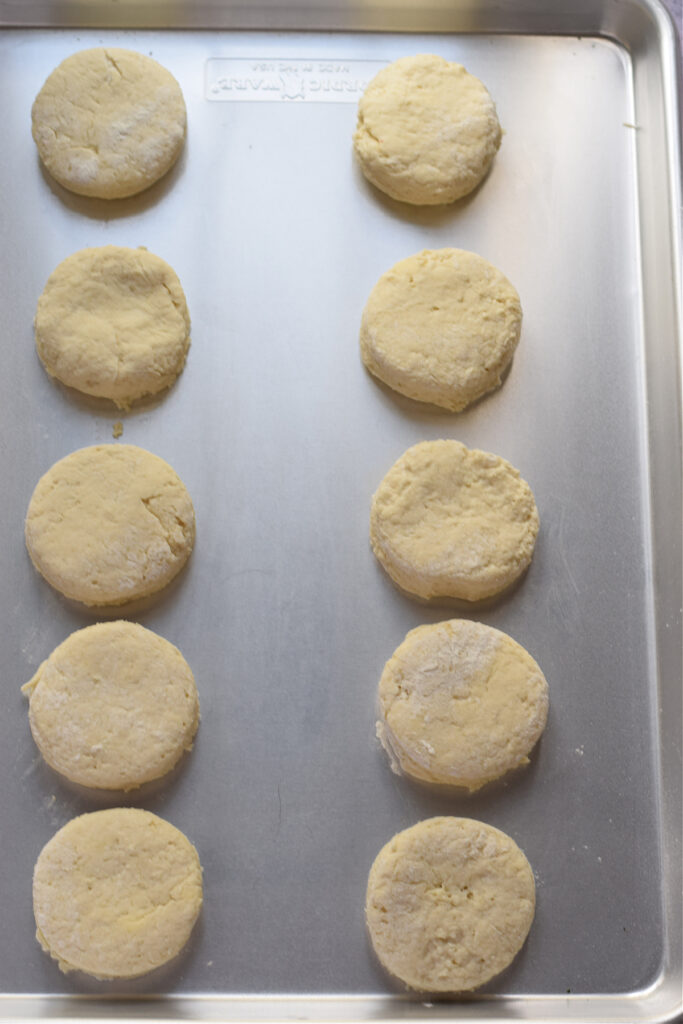 Ready to bake scones on a baking tray.