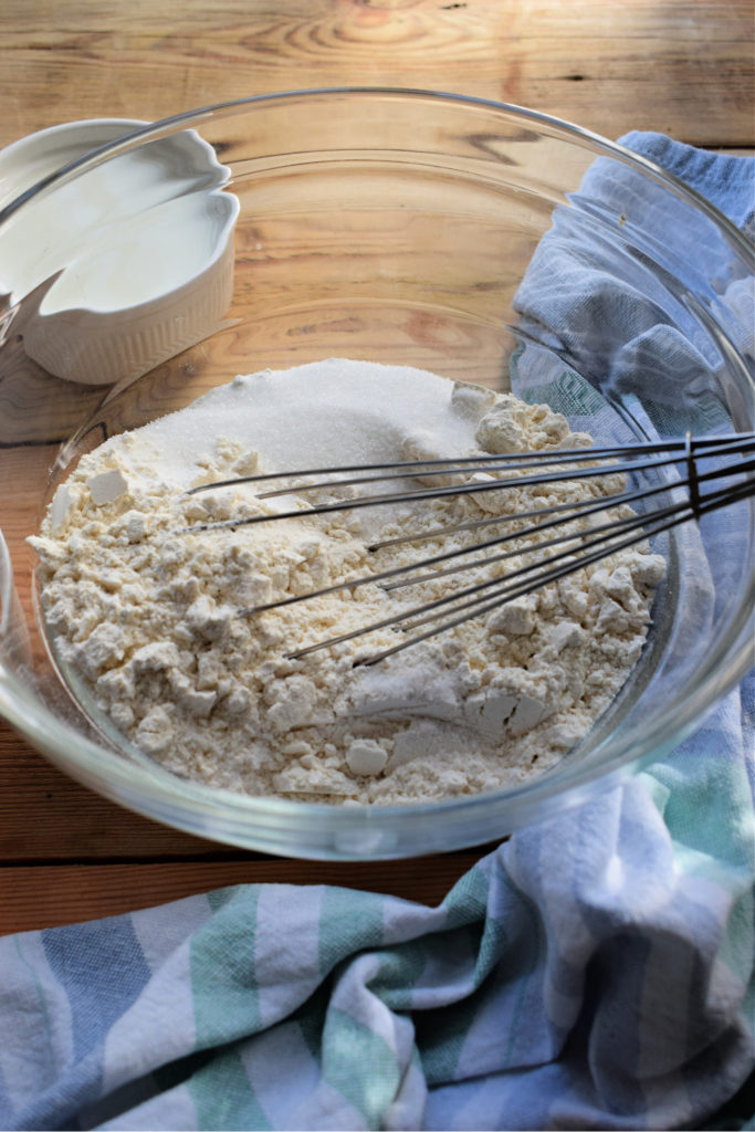 Flour in a glass bowl.