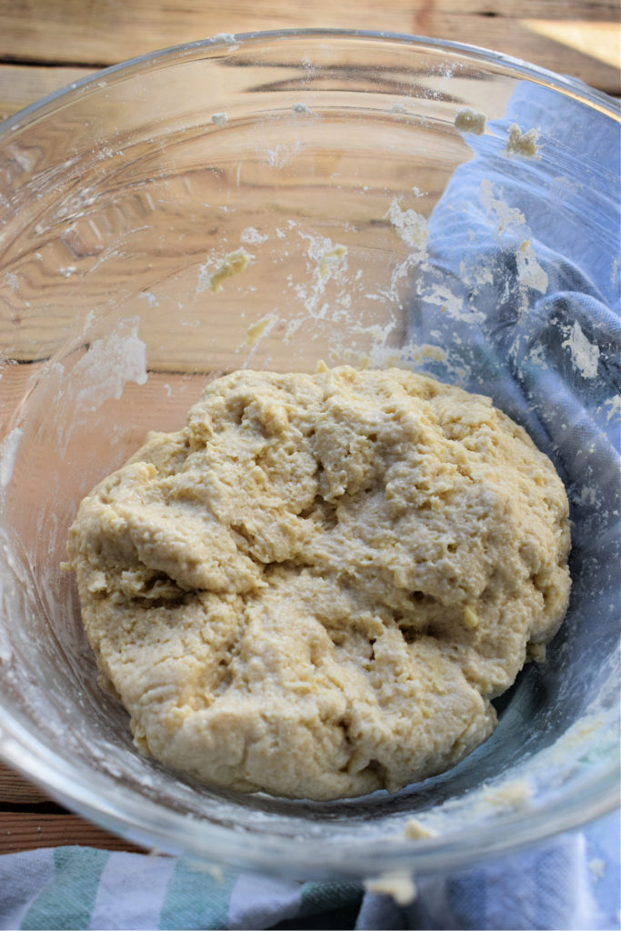 Scone dough in a glass bowl.