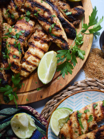 Tex- Mex chicken tenders on a serving board.