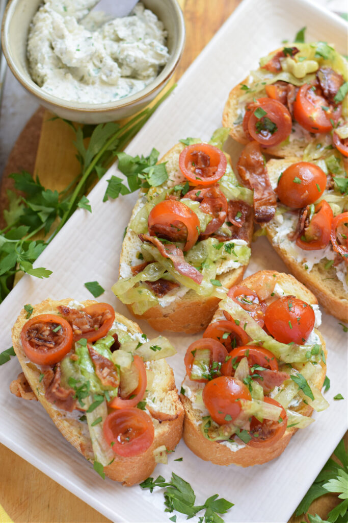 Blt bruschetta on a plate.
