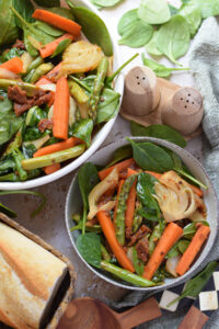Vegetable stir fry in serving dishes.
