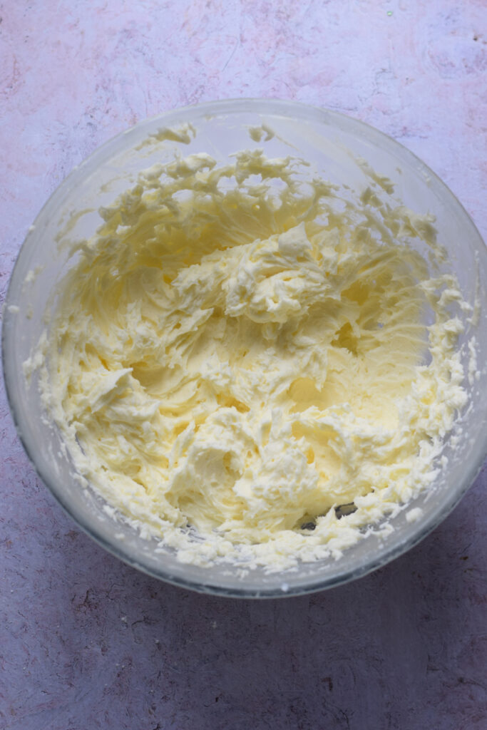 Buttercream frosting in a bowl.