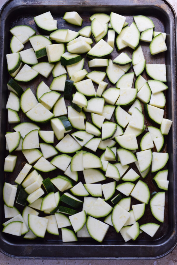 Zucchini on a baking tray.